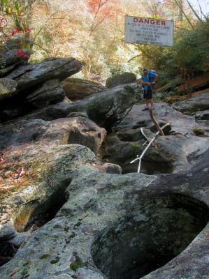 Tyler at the entrance sign. Interpretation = Welcome RAT and friends ! Enjoy your day ! 
