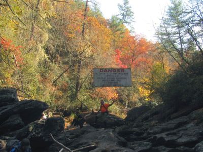 John and Badger gnome posing at the welcome sign 
