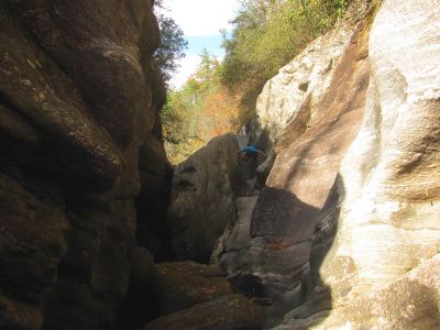 Tyler seems to defy gravity within the slot canyon 
