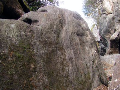 Climbing the fish rock within the slot canyon 
