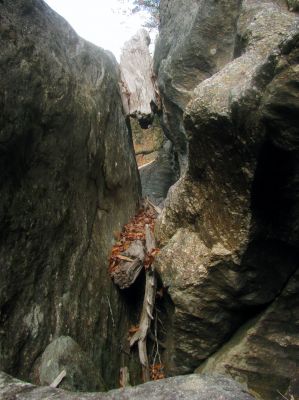 making my way to the top of the blockage rock (fish rock)  in the slot canyon 
