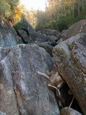 Tyler is small in an ocean of huge rocks 
