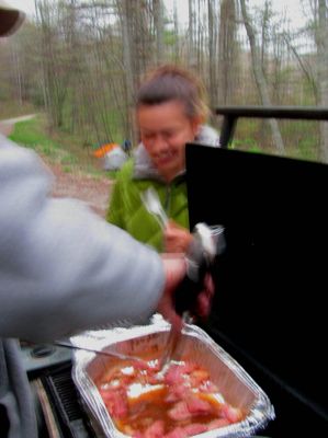 Even though it is blurry, you can see the smile as this hiker gets some of the last of the ham pieces
