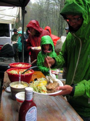 This years Sat night menu was : Steaks, Pork Loin, Salmon, (all grilled) corn on cob, baked potatoes loaded, cole slaw, home made breads, and I am sure there was some other stuff I can`t remember,,, 
