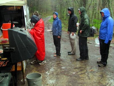 Lined up for hot dogs and bubba burgers,, 
