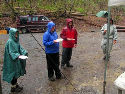 Standing in the rain waiting on more bubba burgers and hot dogs and stuff,, 
