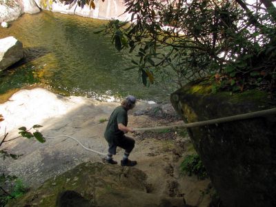 Bol'Dar climbing down the rope to get to the base of the upper part of the Harper Falls
