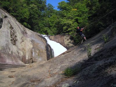 RAT climbing the rope at Harper Falls
