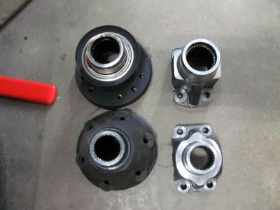 replacing the driveshaft required removing and replacing both yokes (one on front differential and one on front of transfer case) 
