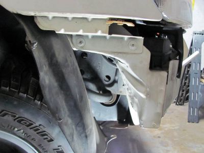 Metal cut and bent, horn wires relocated I am going to save the inner fenders too. (something else most people do away with when doing this) 
