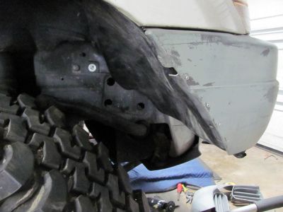 You can see how well the inner fender worked out in the front and that shiny bolt is where I had to move it forward 2 inches from the black plastic clip you also see in there 
