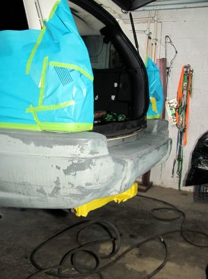 Taping it up to paint the trim black 
