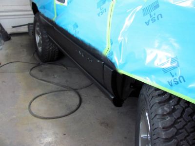 After the first couple of coats of black trim paint. Plastic trim was in bad shape and had been painted before with a gray that was too light and was a shoddy job it was flaking off so a LOT of sanding had to be done to get it all off and prepped for some good paint done correctly. 
