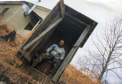Lost Cove
Rat in the outhouse behind the old school house in Lost Cove (it has purple shag carpet!)  (taken in late 80`s)
