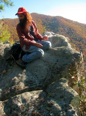 Larry sitting on the highest point of the Rhino Cliffs
