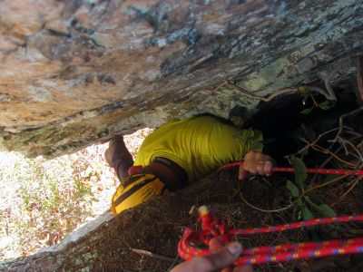 John trying to get some foot traction but there is none ! The face of the rock in the crack is completely slick ! 
