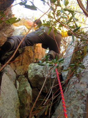 John goes ahead of me to complete the last leg of the climb 
