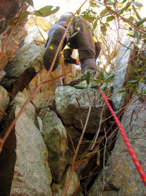 John goes ahead of me to complete the last leg of the climb 
