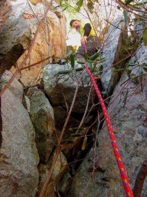 John goes ahead of me to complete the last leg of the climb 
