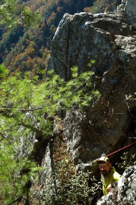 John going down the crack on the rope 
