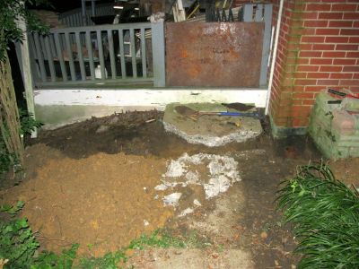 A lot of digging to remove the old gutter drain pipe. 
