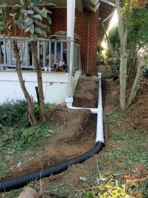 New gutter drain after removing the old clay pipes. 
