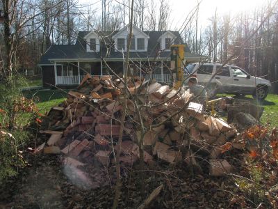 Tyler splitting wood at another neighbors house after dropping a 120 foot tall Oak. 
