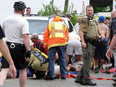 Car crashes hiker parade

