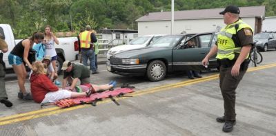 Car crashes hiker parade
