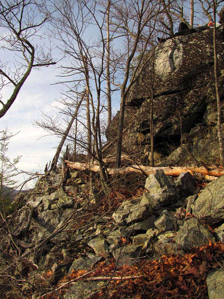 Dano atop rock ledge