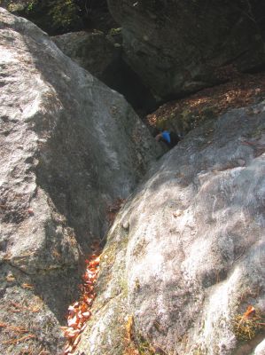 Tyler goes down to explore the crack that would end up being an entrance to the gut of the upper part of the slot canyon. This was therefore named 'Little RAT Crack' 

