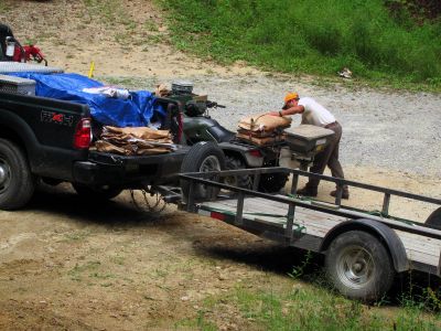 Forest Service guy loading up clover seed and fertilizer at Old House Gap

