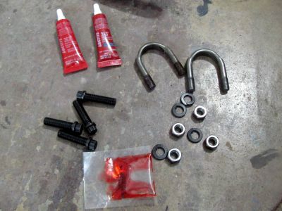 new u joint mounting clips and bolts (came with driveshaft from IRO) and some assorted locktite. (blue for u-joint screws and red for yoke nuts) 

