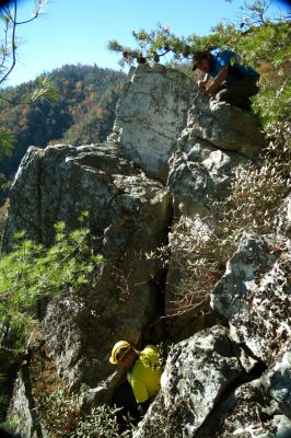 John going down the crack on the rope 

