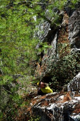 John going down the crack on the rope 
