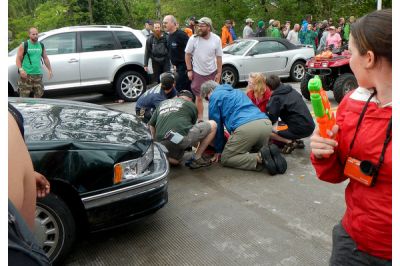 Car crashes hiker parade
